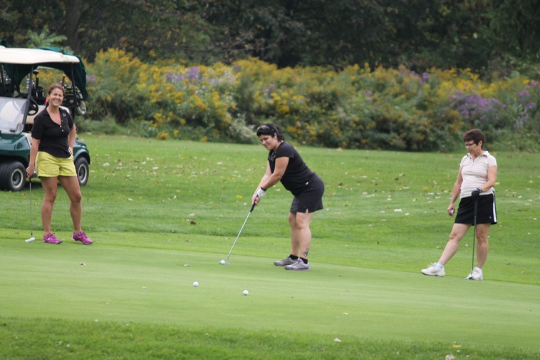 Shona sinking the putt?